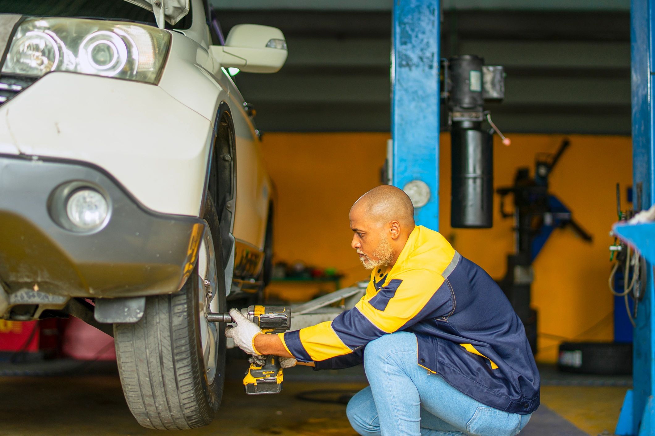 Mechanic working in a car service workshop